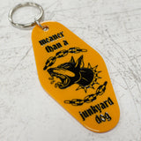 Meaner Than A Junkyard Dog Orange Keychain Angled View